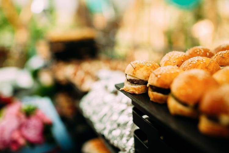 tiny burgers on display at a food festival